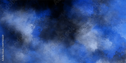 Blue smoke in dark background.Texture and desktop picture .blue texture with colorful smoke  decorative and blurry and grunge blue paper texture  Colorful blue textures for making flyer and poster. 