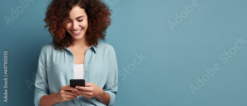 woman texting on cell phone Over  Blue Background 