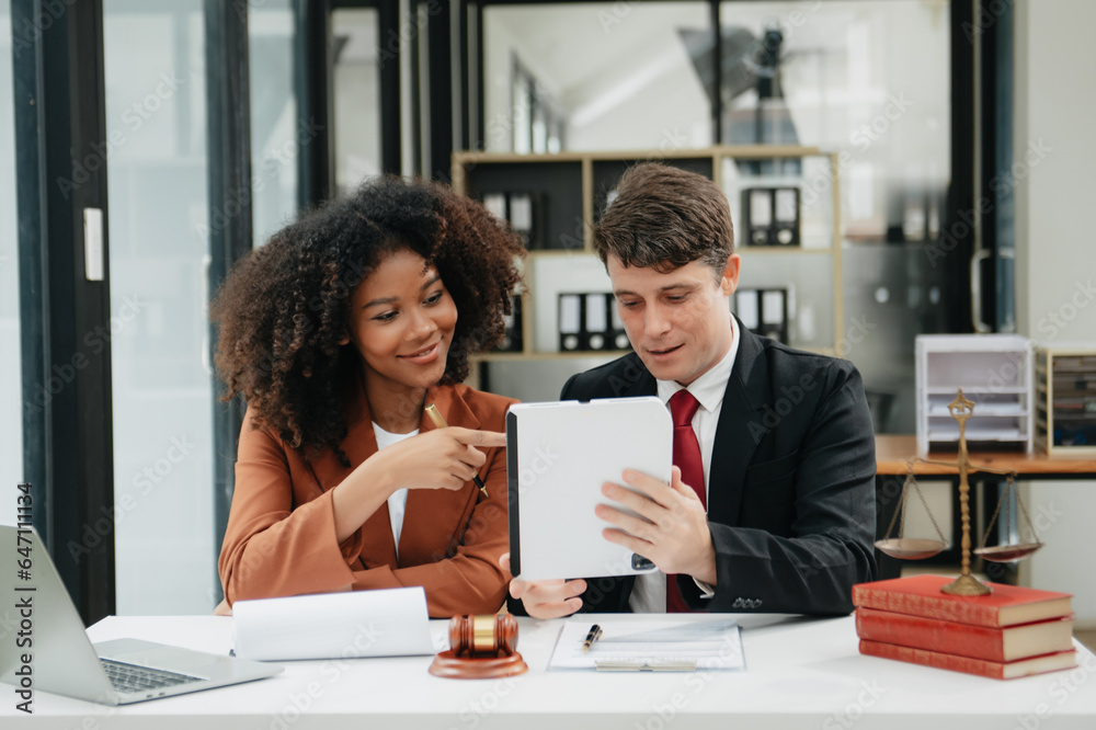 business team and lawyers discussing contract papers sitting at the table. Concepts of law, advice, legal services. at office business team and lawyers discussing contract papers sitting at the table. Concepts of law, advice, legal services. at office