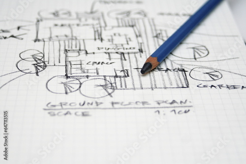 sketching architectural plans with pencils on a sketchbook on a desk, sketch design, architect, freehand, architectural drafting.