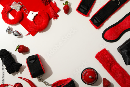 A collection of sex toys on a light background.