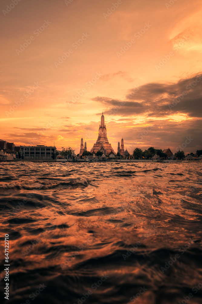 A large old pagoda along the Chao Phraya River at Wat Arun, Bangkok, Thailand.