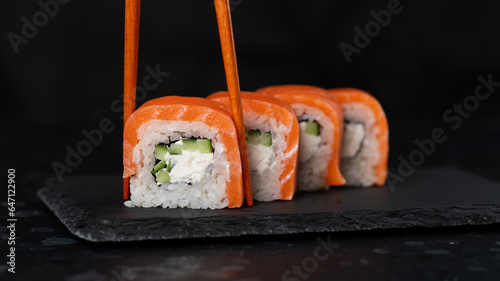 Sushi and rolls cooked on the table