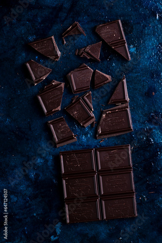 A chocolate bar broken into pieces