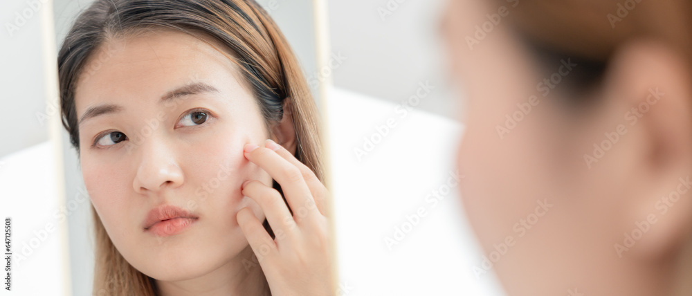 Young woman asian are worried about faces Dermatology and allergic to steroids in cosmetics. sensitive skin, red face from sunburn, acne, allergic to chemicals, rash on face. skin problems Young woman asian are worried about faces Dermatology and allergic to steroids in cosmetics. sensitive skin, red face from sunburn, acne, allergic to chemicals, rash on face. skin problems