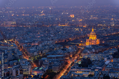 View of Paris at night with the Invalides building, France