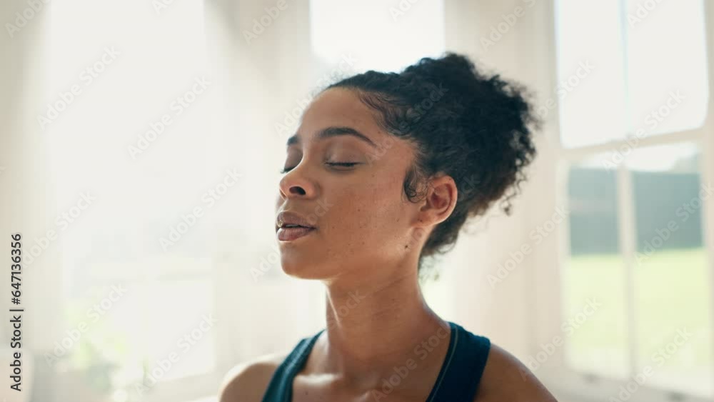 Face, yoga and meditation to relax with a woman closeup in a home for fitness, mindfulness or awareness. Exercise, zen and breathing with a young person in an apartment for health, wellness or peace