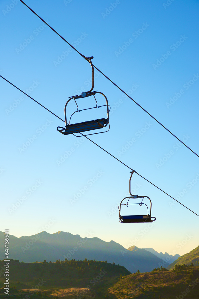 Silhouette of a chairlift in Candanchu, Pyrenees. Silhouette of a chairlift in Candanchu, Pyrenees.