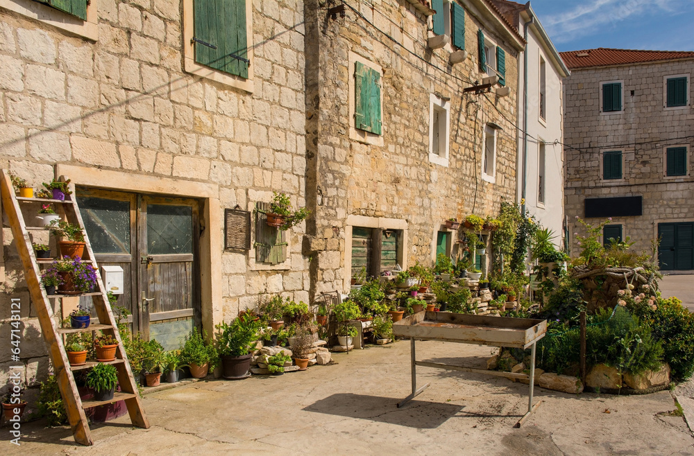 Old stone houses in the historic centre of Kastel Kambelovac in Kastela on the mainland of Croatia
