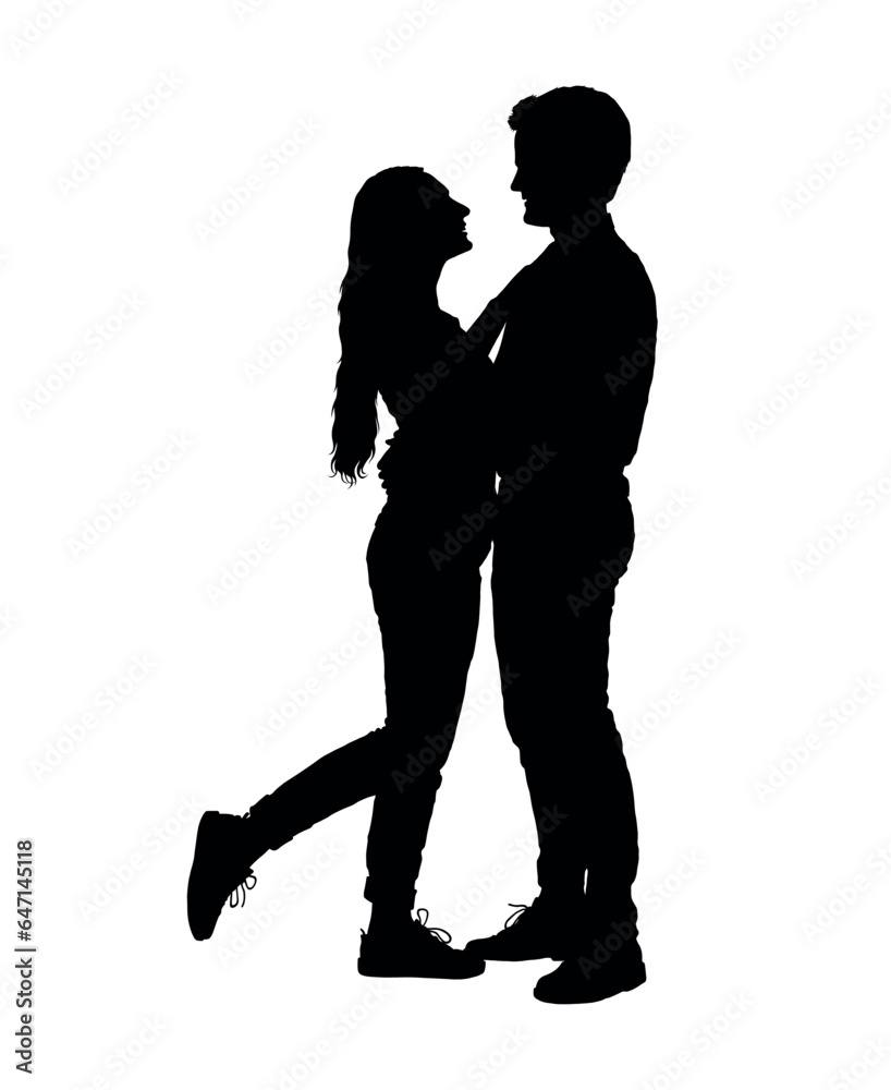 Couple standing facing each other silhouette.