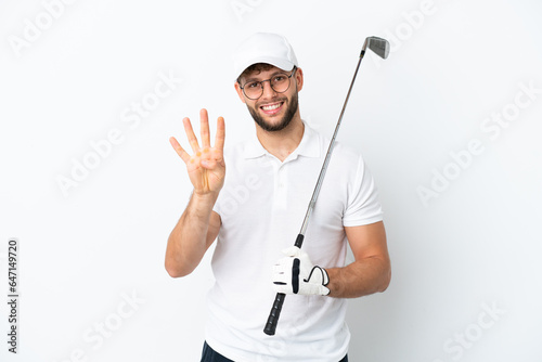 Handsome young man playing golf isolated on white background happy and counting four with fingers
