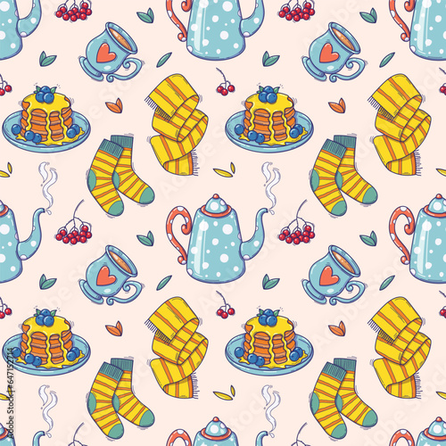 Autumn seamless pattern with cozy elements in doodle style. Vector illustration of warm clothes and delicious tea