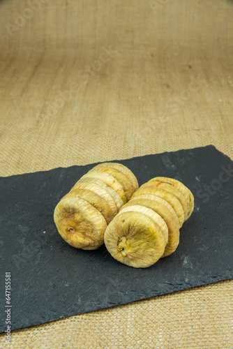 Dried figs lerida on rock plate table