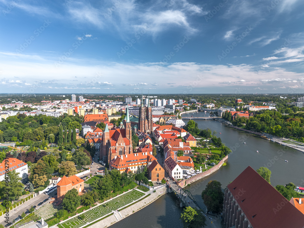 Aerial panoramic summer view of the beautiful green Tumski Island (Ostrów Tumski) in Wrocław, Poland (Dolny Śląsk)