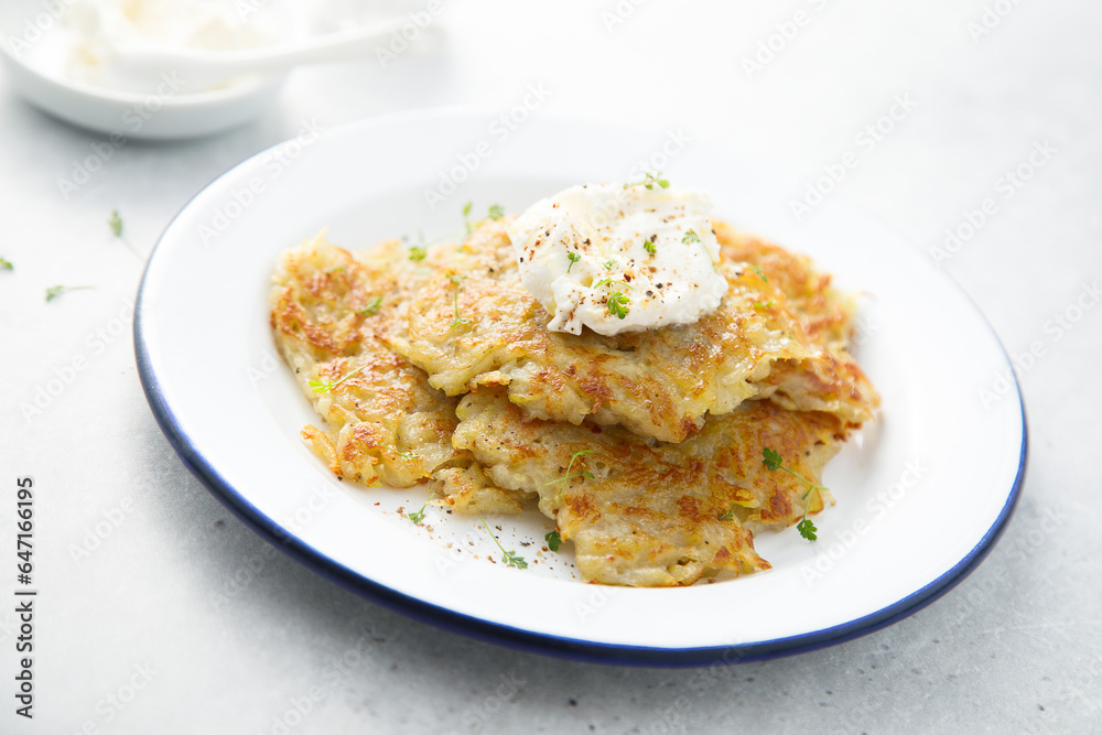 Homemade potato latkes with cream cheese Homemade potato latkes with cream cheese