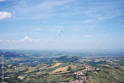 landscape view with birds in the sky