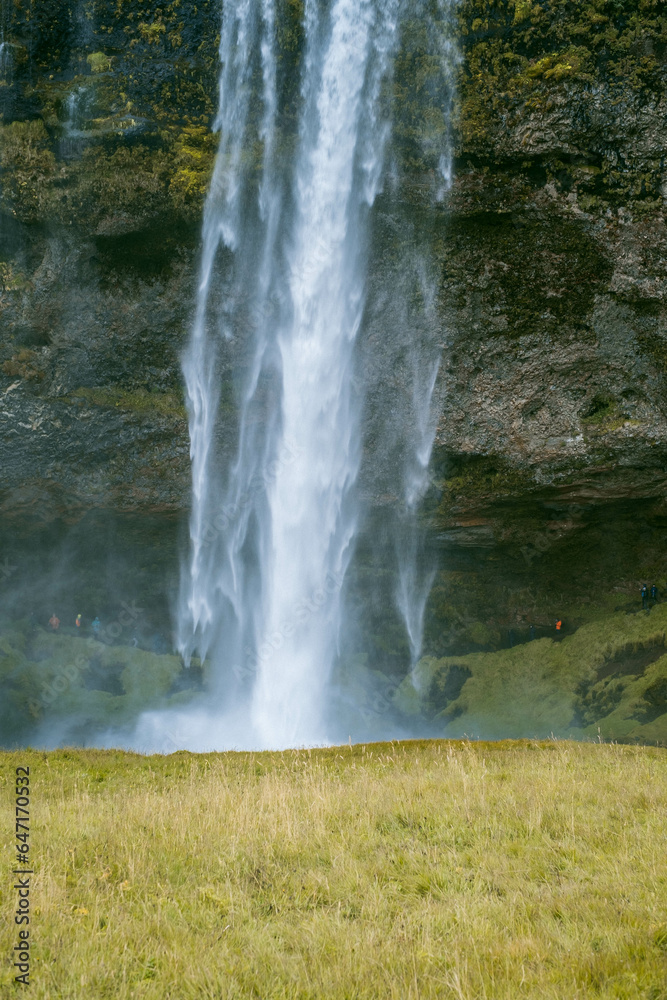 Kvernufoss a 30-meters high waterfall accessible via a rugged hiking trail in Iceland