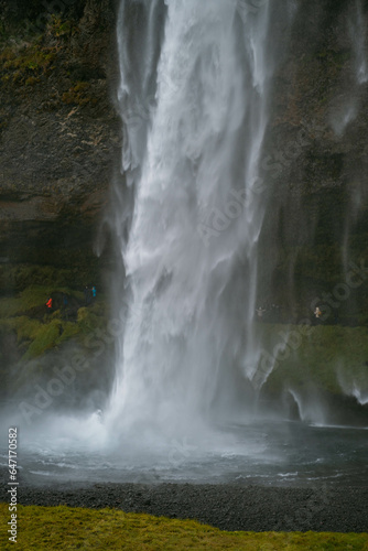 Kvernufoss a 30-meters high waterfall accessible via a rugged hiking trail in Iceland