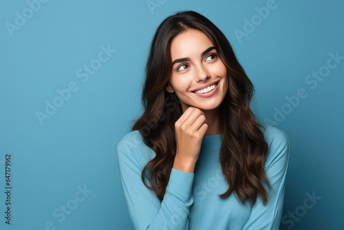 Young indian woman giving thinking expression. Lifestyle, people emotions and casual concept.