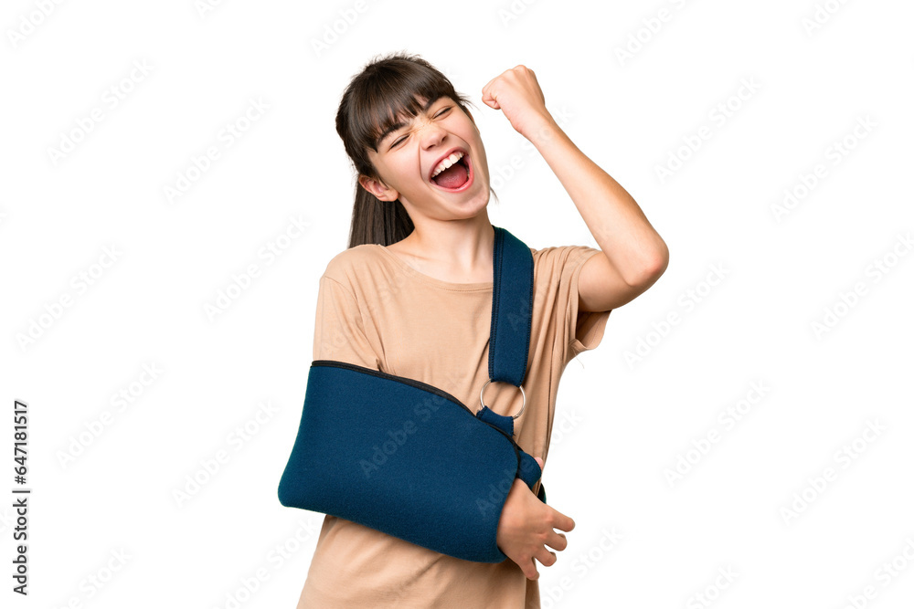 Little caucasian girl with broken arm and wearing a sling over isolated background celebrating a victory Little caucasian girl with broken arm and wearing a sling over isolated background celebrating a victory