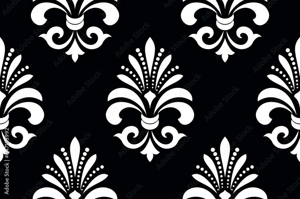 Fototapeta premium Wallpaper in the style of Baroque. Seamless vector background. White and black floral ornament. Graphic pattern for fabric, wallpaper, packaging. Ornate Damask flower ornament