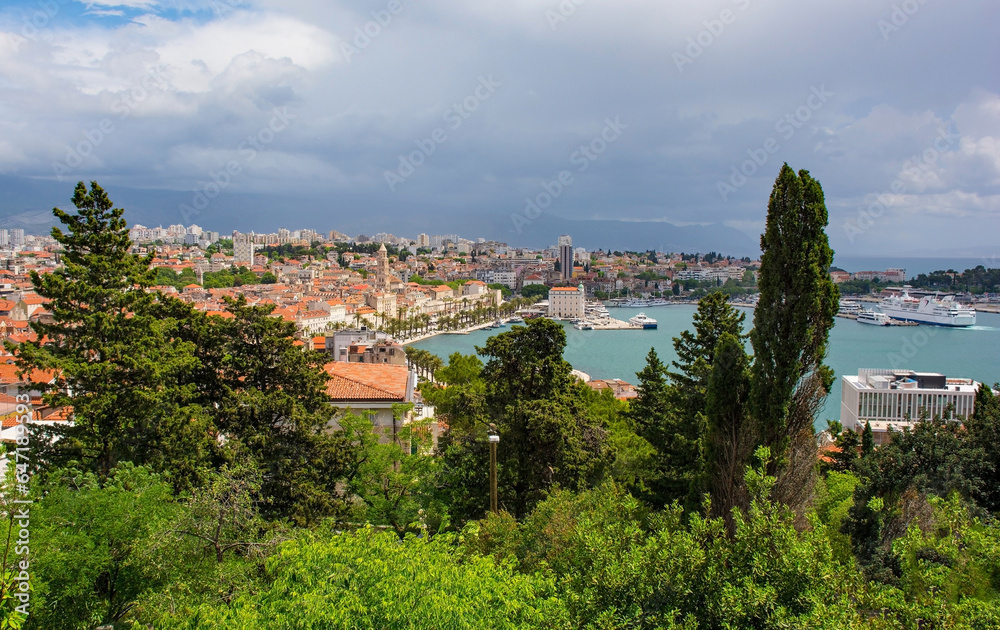 A view of the historic coastal town of Split in Croatia from Marjan Hill which overlooks the town, Cruise ships and ferry boats can be seen in the harbour area far right