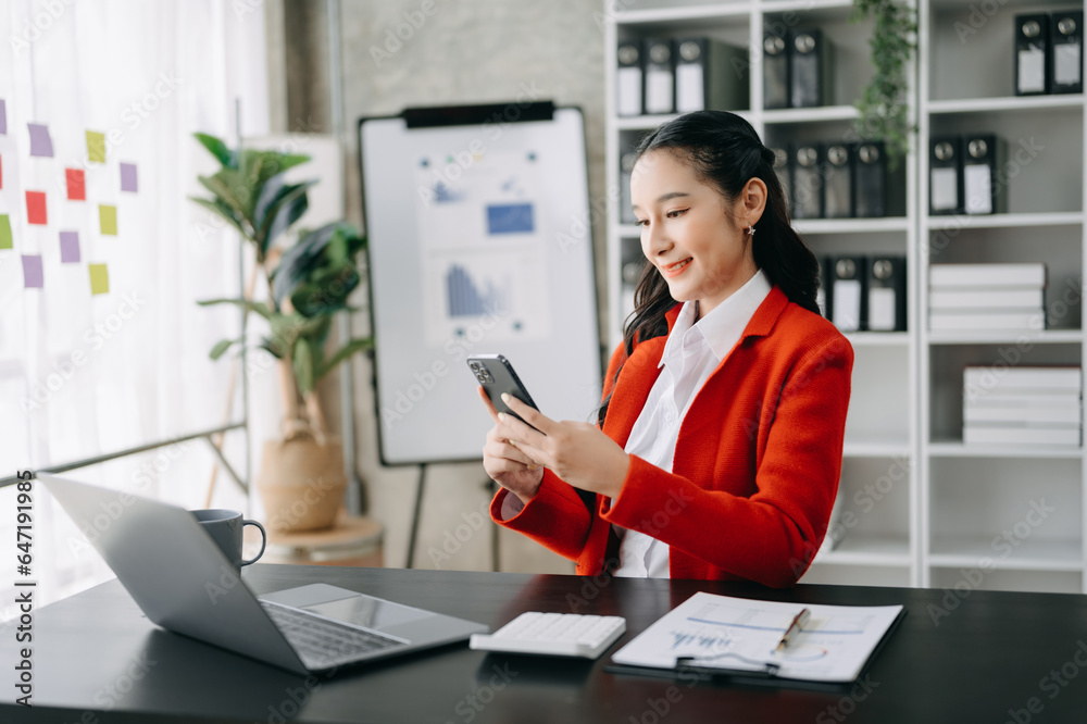 Woman freelancer is working her job on computer tablet and laptop Doing accounting analysis report real estate investment data, Financial at office. Woman freelancer is working her job on computer tablet and laptop Doing accounting analysis report real estate investment data, Financial at office.