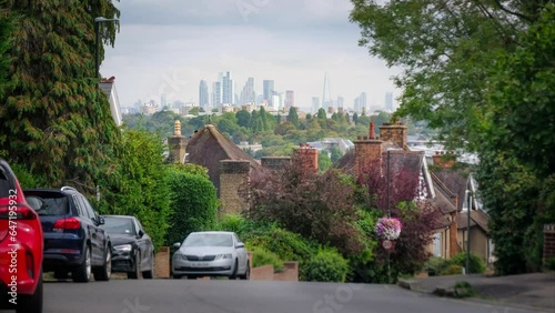 London- Timelapse of large suburban houses and view of the City of London skyline from Wimbledon