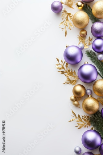 opener. New Year. a special bright Christmas installation of Christmas tree branches purple and golden balls. space for text. white background