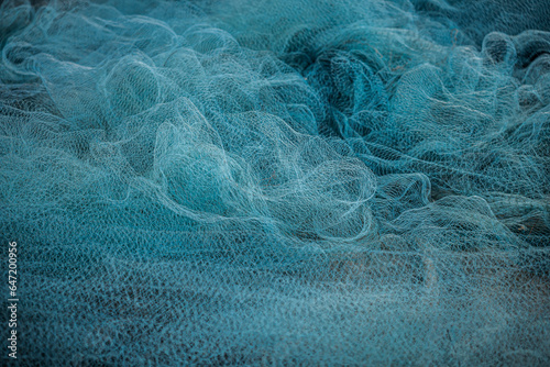 Blue Fishing net, Fisherman hunting tools, net rope texture / pattern net / Abstract / Background. photo