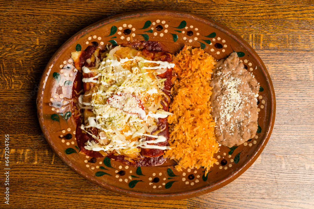 Chicken enchiladas with red sauce