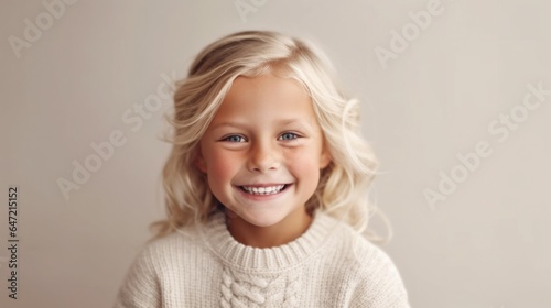 A smiling blonde kid, clad in neutral clothing, against a studio light beige backdrop. Generative AI