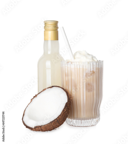 Bottle of delicious syrup, coconut and glass of iced coffee isolated on white