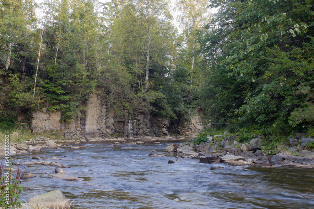 mountain river between rocks and trees mountain river between rocks and trees