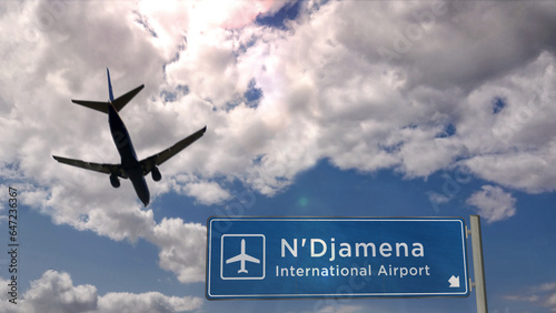 Plane landing in N'Djamena Chad airport with signboard