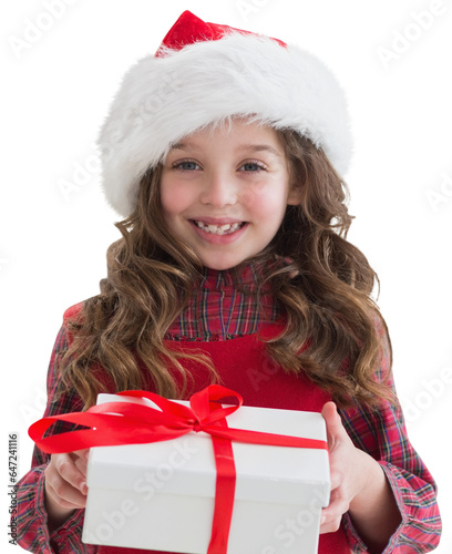 Digital png photo of caucasian girl wearing santa hat and holding present on transparent background