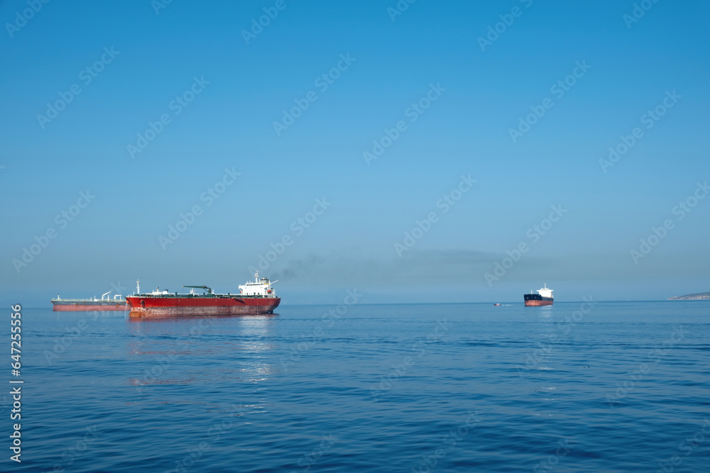 Container cargo ship loaded in open sea at Piraeus port Greece. Import export business and logistics