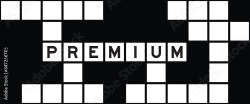 Alphabet letter in word premium on crossword puzzle background