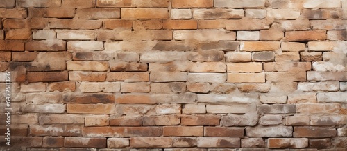 Background of an aged beige brick wall