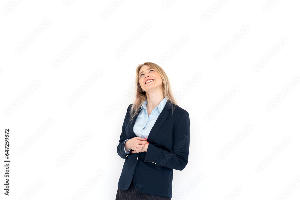 Attractive blond businesswoman standing and smiling isolated on white background Attractive blond businesswoman standing and smiling isolated on white background