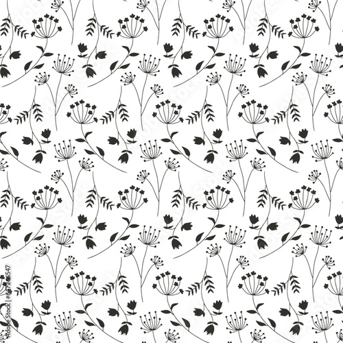 Monochrome seamless pattern with black wild flowers silhouettes on white background. Vintage ditsy floral repeat pattern. © akini