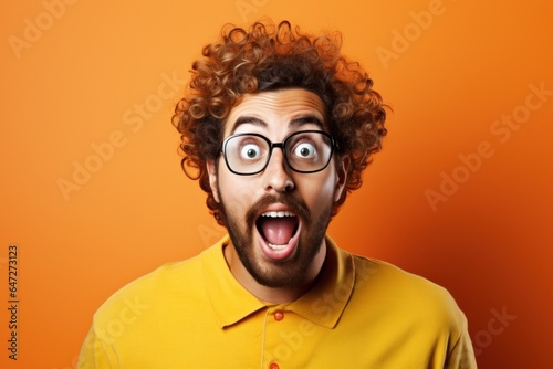 A man with a surprised look on his face, expressing shock or astonishment. Suitable for illustrating surprise, disbelief, or unexpected reactions. Can be used in various contexts, such as humor, react © Fotograf
