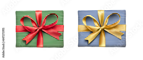Obraz na płótnie A top view of two Christmas or birthday presents from above with gold and red ribbon bows with a green and blue stripped patterns on the wrapping paper isolated against a transparent background. w salonie