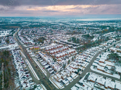 Experience the raw power and serene beauty of a winter storm in Barrie, Ontario through captivating drone views. This stunning footage captures the icy transformation of the landscape, as snow blanket © contentzilla