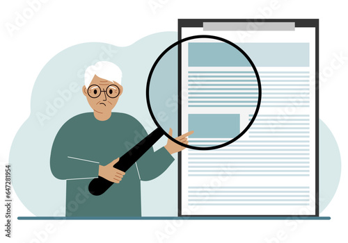 A old man holds a magnifying glass and examines a document, contract or agreement. The concept of a lawyer, businessman, or attorney at work.