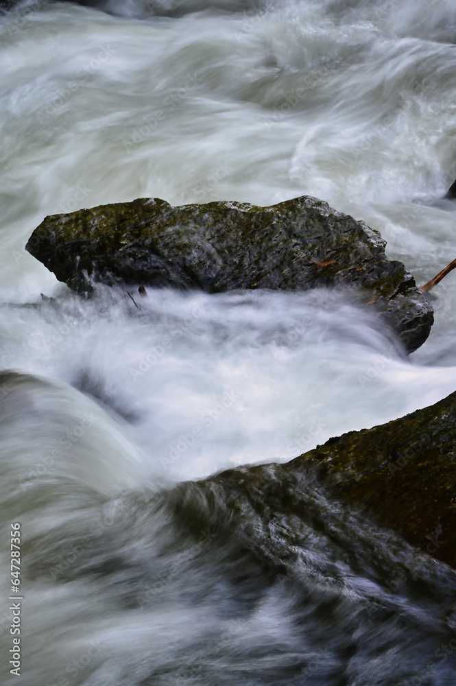 water flowing over rocks water flowing over rocks