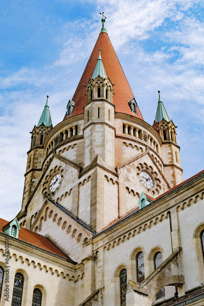 Vienna, Austria. Detail of the Church of San Francesco d'Assisi, in the Mexicoplatz park. Vertical image. 2023-08-02.