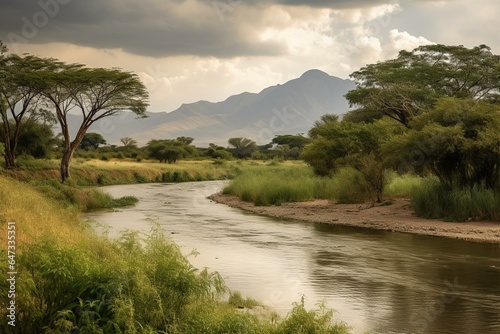 Scenic African scenery featuring river  trees  mountains  under a cloudy sky. Generative AI