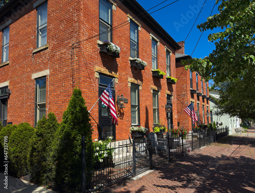 Old residential buildings along brick sidewalks maintain an old world charm in German Village, a uniquely preserved neighborhood of Columbus, Ohio