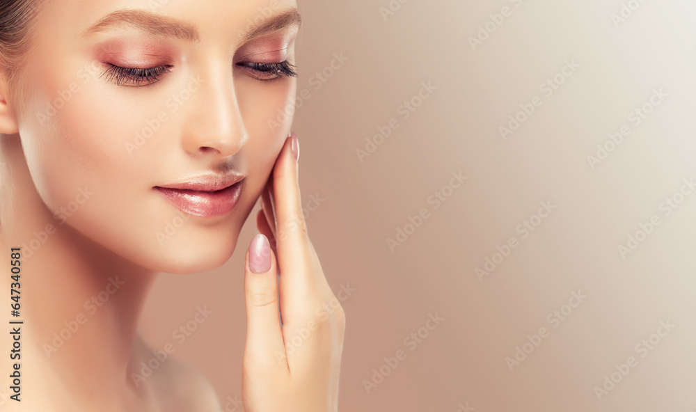 Beautiful young woman with clean fresh skin .Girl beauty face care. Facial treatment . Cosmetology and Spa Beautiful young woman with clean fresh skin .Girl beauty face care. Facial treatment . Cosmetology and Spa